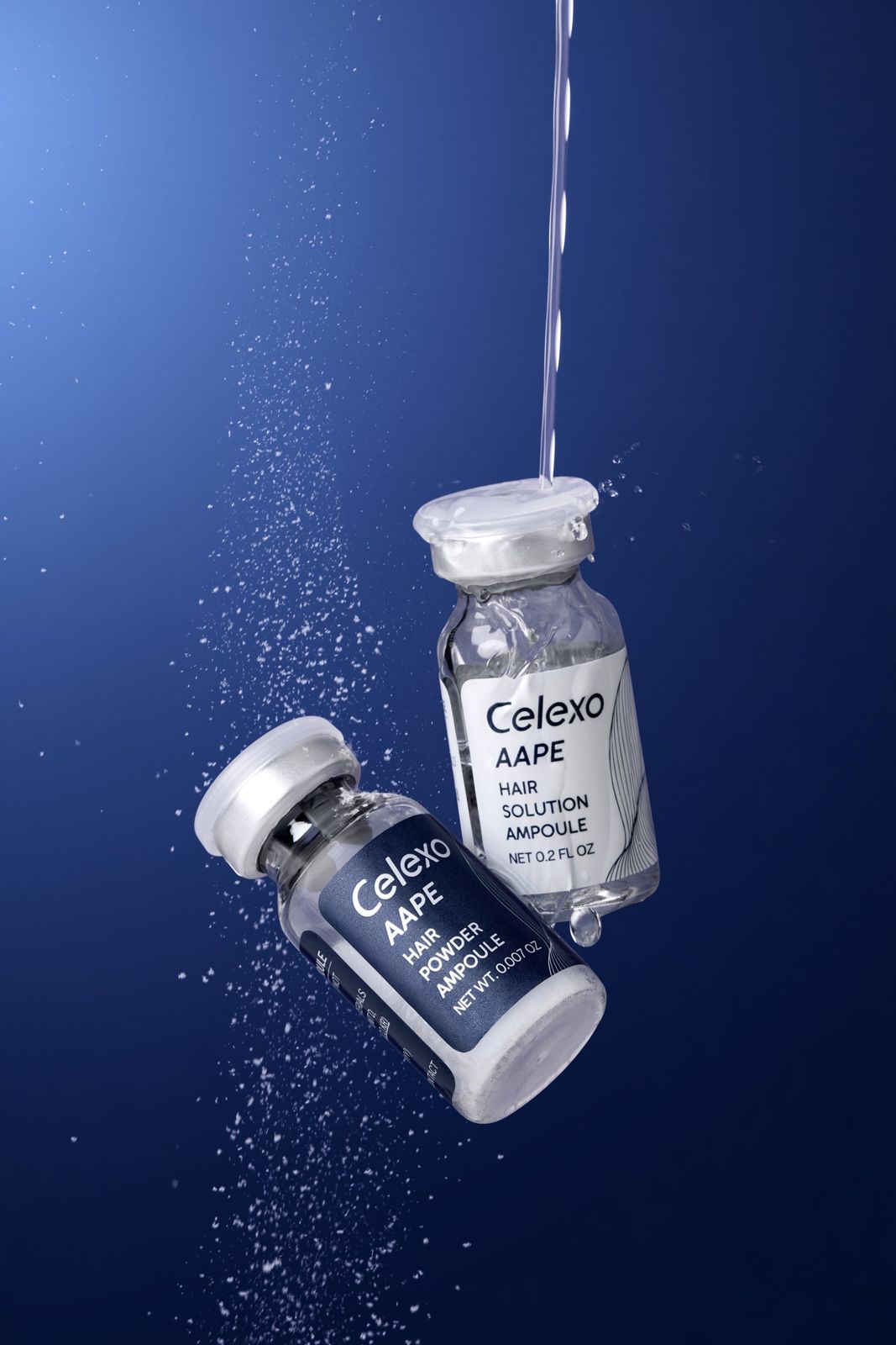 Celexo · AAPE 헤어 — 솔루션 앰플과 파우더 앰플을 함께 띄우고 반짝이는 입자를 더한 연출컷, 블루 배경