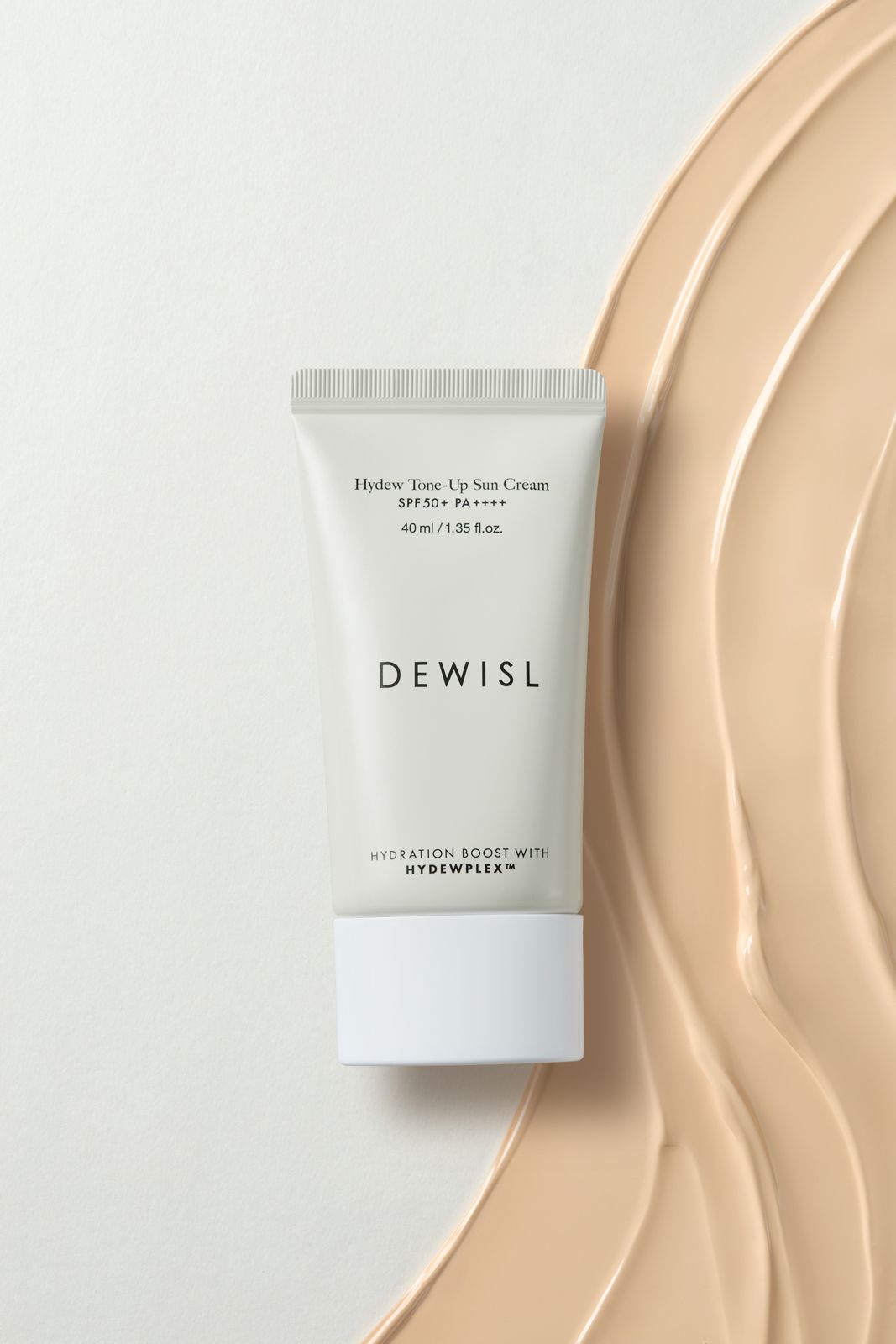 DEWISL · 제품촬영 — 제품과 큰 웨이브 형태의 제형을 함께 연출한 컷