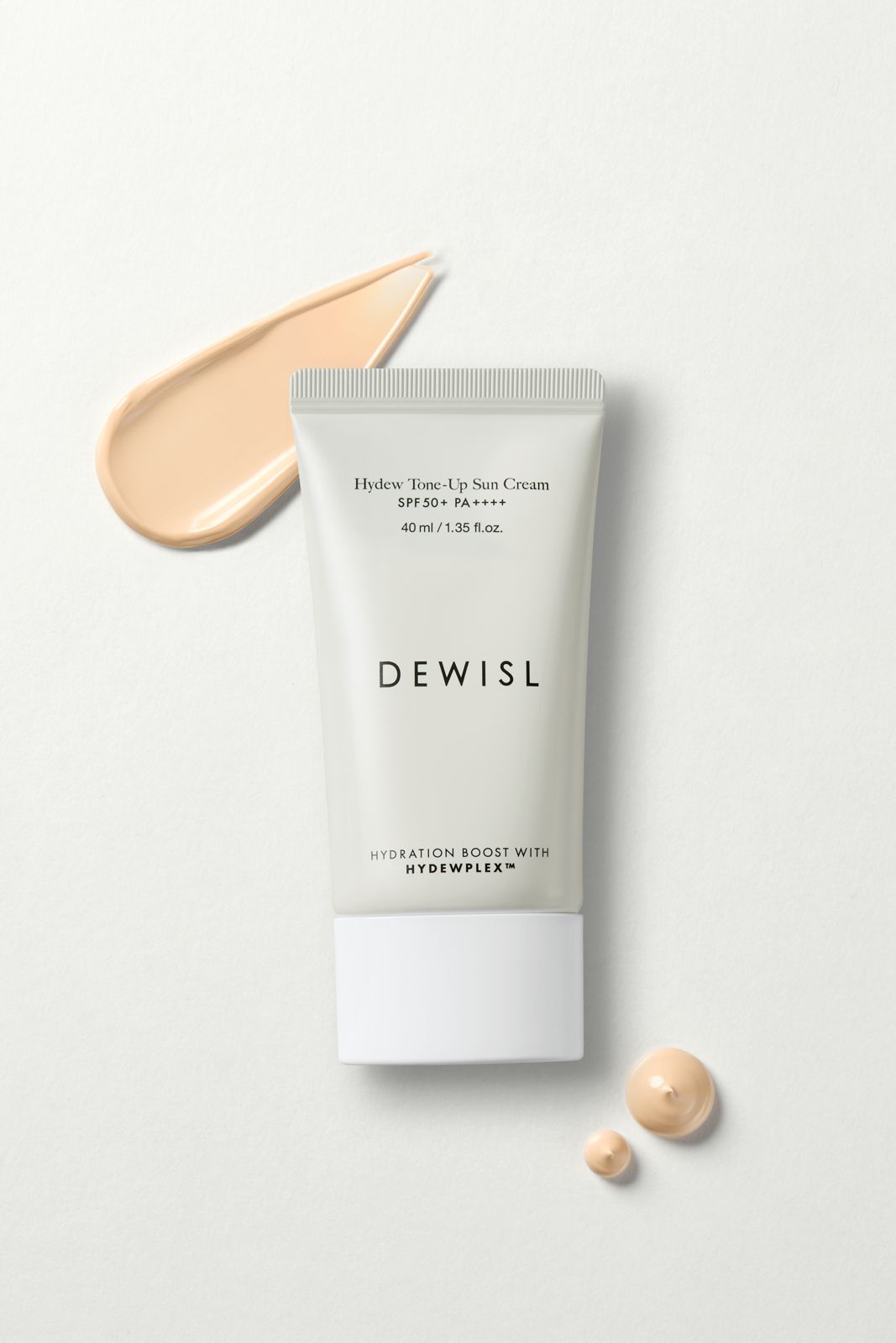 DEWISL · 제품촬영 — 제형 스와치와 방울을 제품과 함께 배치한 플랫레이 컷