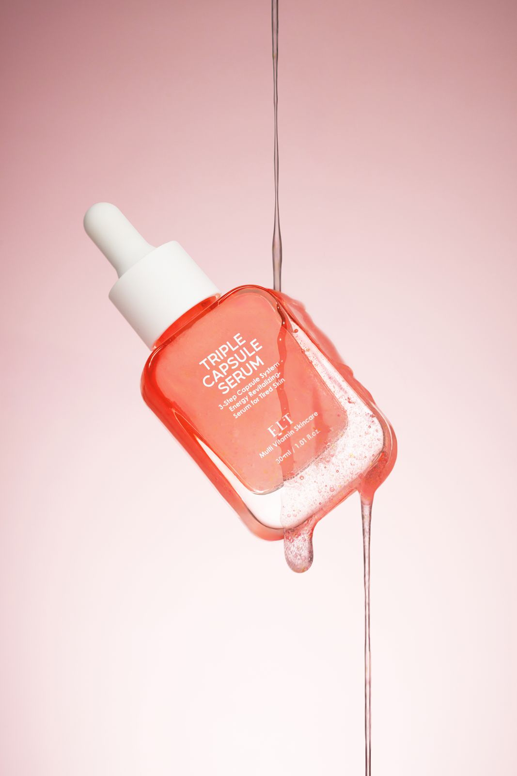 ELT COSMETIC · 캡슐세럼 — 병 위로 워터스트림이 흘러내리는 합성이펙트 연출컷