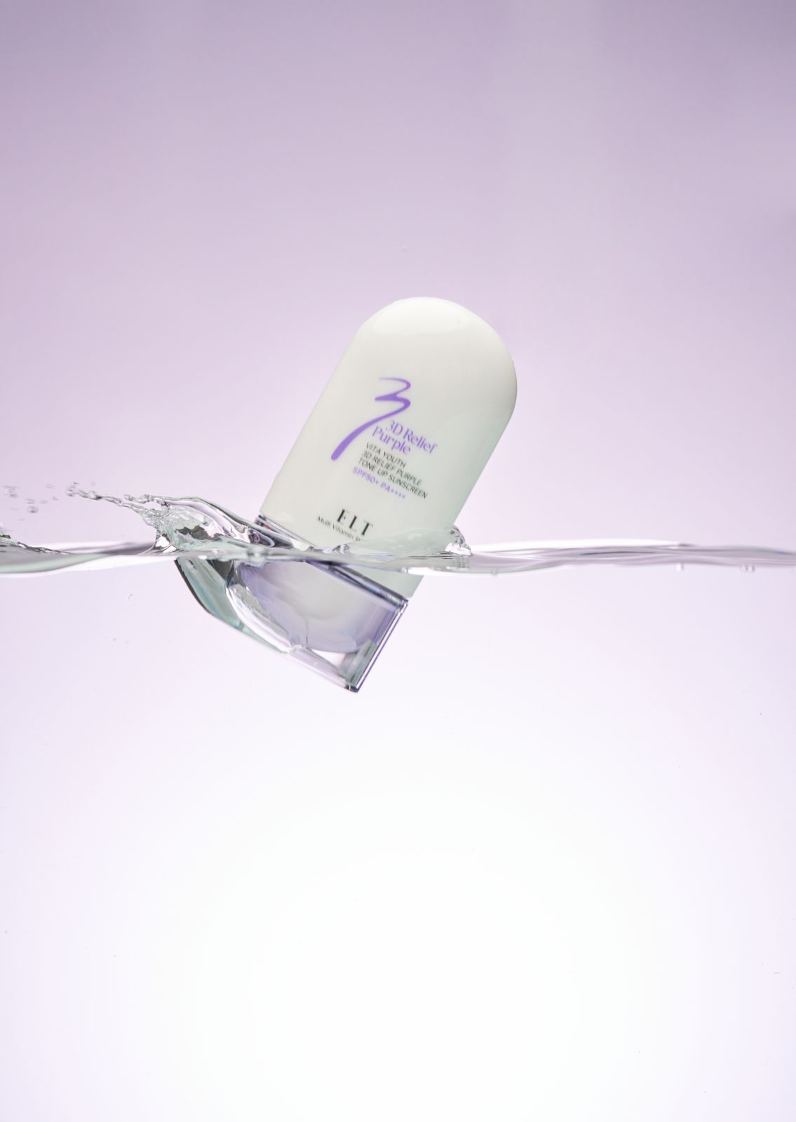 ELT COSMETIC · 선스크린 — 제품이 수면에 부딪혀 물살이 이는 합성이펙트 연출컷