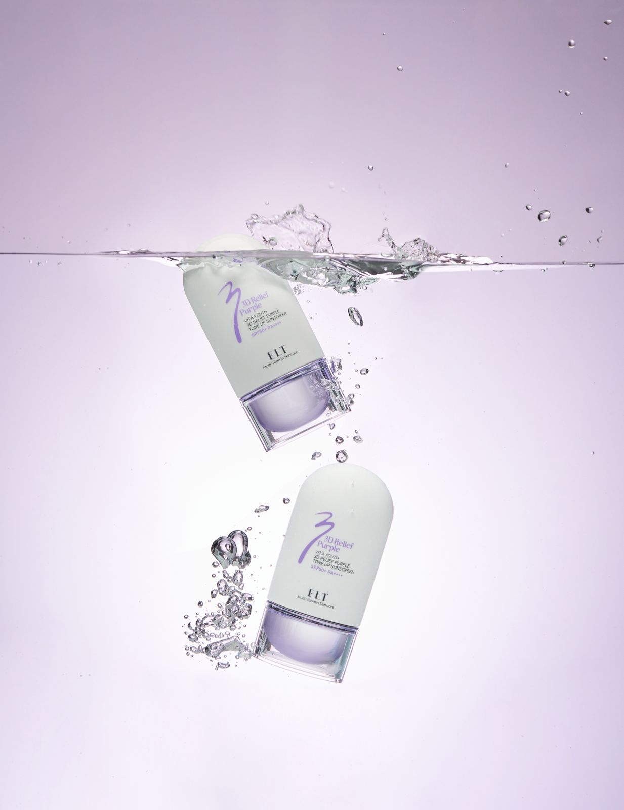 ELT COSMETIC · 선스크린 — 제품 2개가 물속으로 가라앉으며 기포가 이는 합성이펙트 연출컷