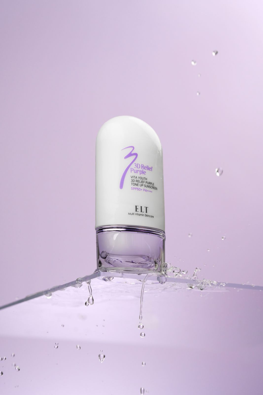ELT COSMETIC · 선스크린 — 제품 주변으로 물방울이 튀는 합성이펙트 연출컷