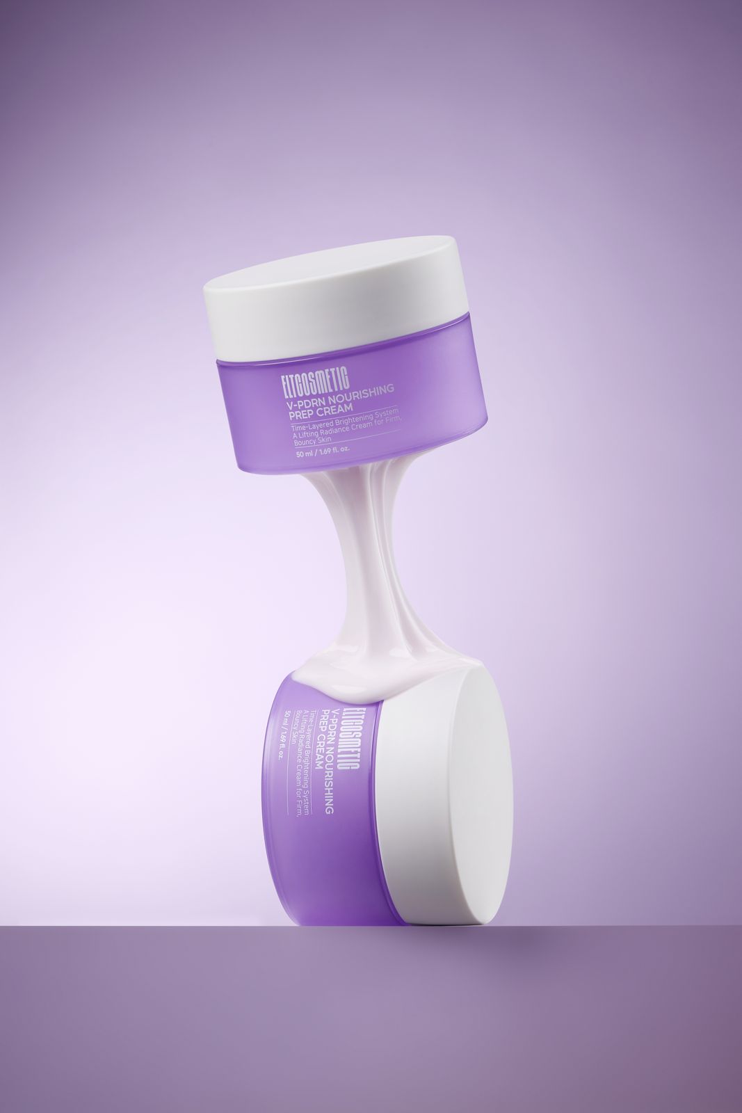 ELT COSMETIC · V-PDRN 크림 — 두 용기를 위아래로 배치하고 사이에 제형을 늘어뜨린 연출컷