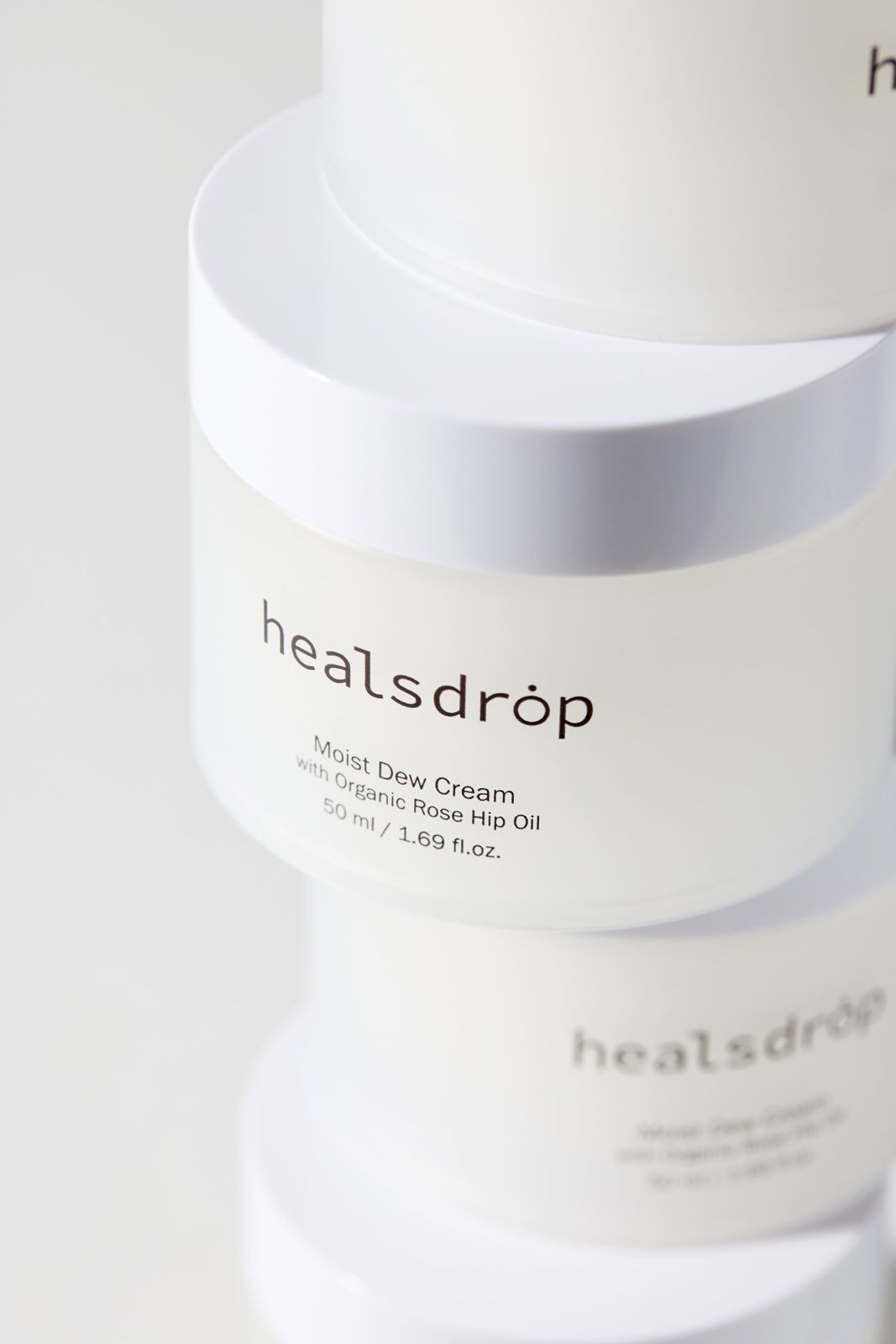 HEALSDROP · 크림 — 제품 라벨을 클로즈업한 컷, 화이트 배경