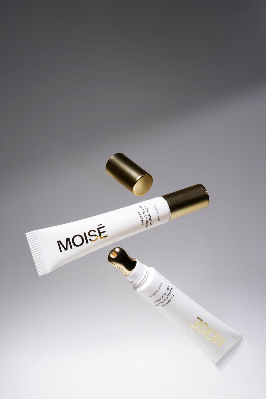 MOISE · 8 펩타이드 더블 볼륨 립 트리트먼트 제품 촬영 컷