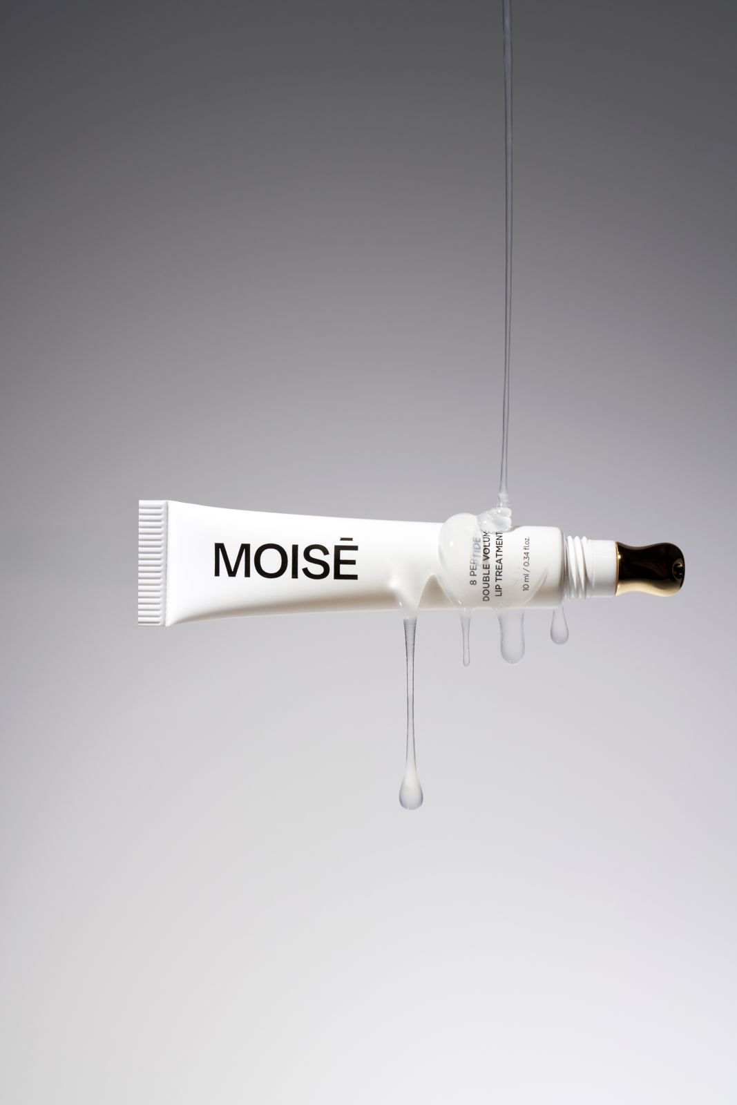 MOISE · 8 펩타이드 더블 볼륨 립 트리트먼트 제품 촬영 컷