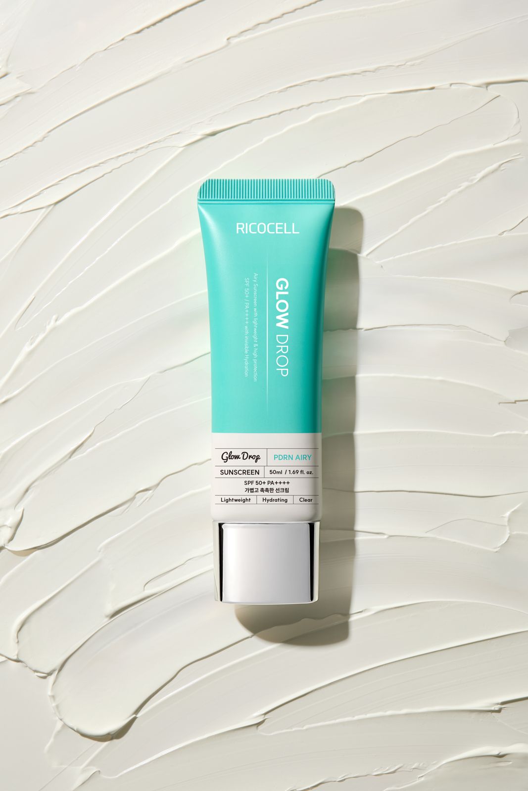 RICOCELL · PDRN 선크림 — 제형 텍스처 배경 튜브컷